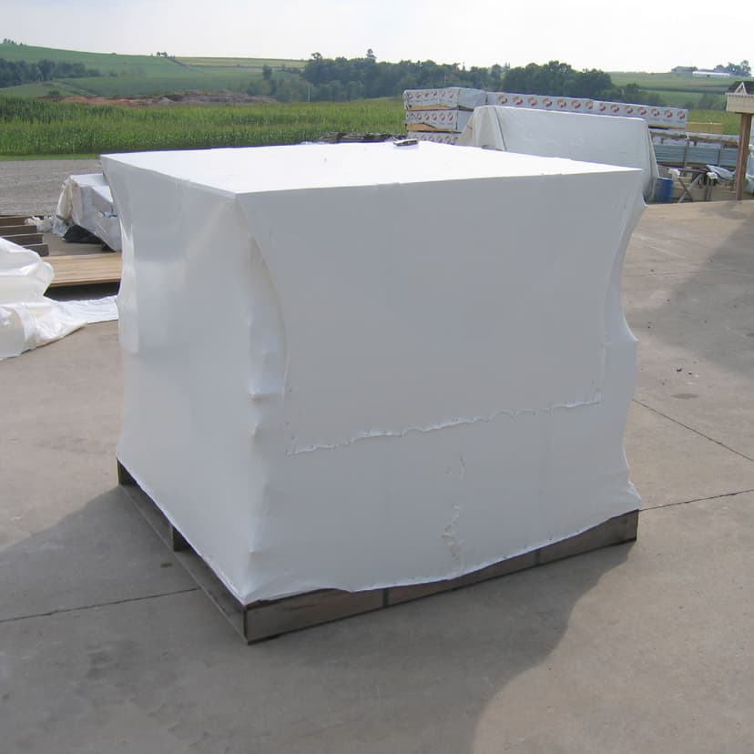 Packaged playhouse kit on a pallet ready for delivery.