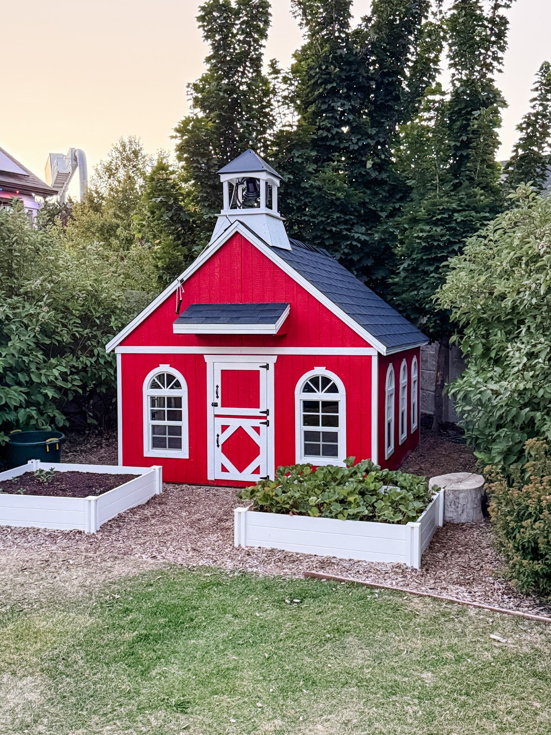 schoolhouse playhouse with bell